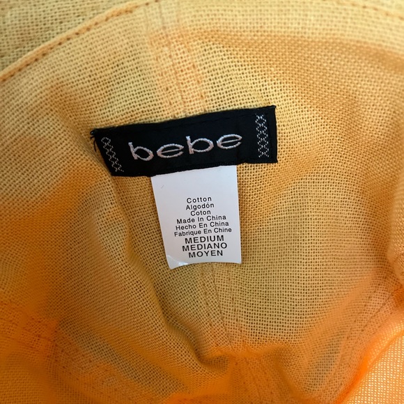 Bebe  NWT bucket hat. Multi color pink/orange canvas hat. Size medium. - Picture 2 of 4